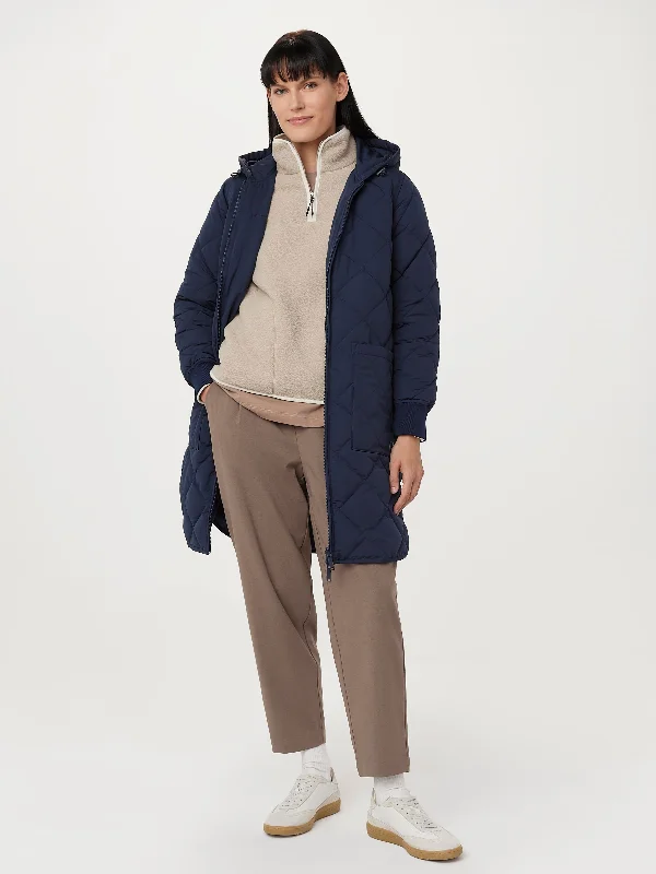 Women's bomber jackets with a holographic finish for a futuristic and eye - catching look The Skyline Maxi Hooded Coat in Space Blue Women's bomber jackets with a holographic finish for a futuristic and eye - catching look The Skyline Maxi Hooded Coat in Space Blue