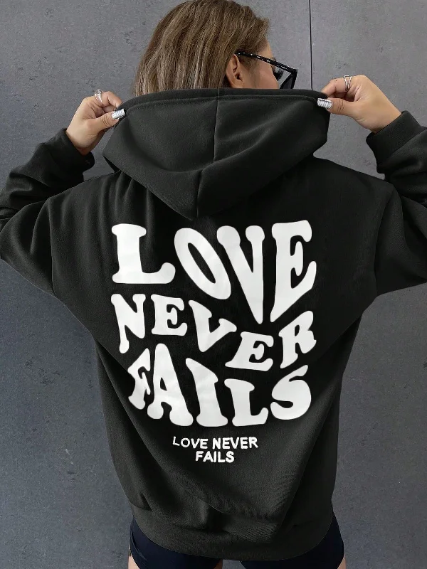 Women's pullover hoodie with a side slit for a modern and relaxed fit Love Never Fails