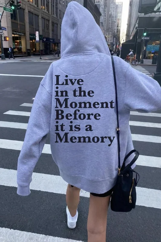 Women's hoodie with a kangaroo pocket and a pom - pom drawstring for added charm Memory