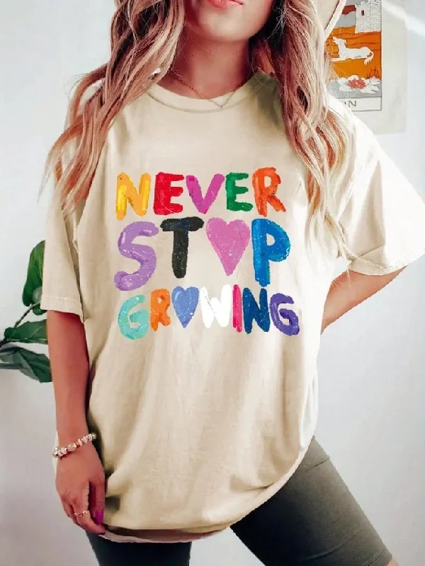 Women's oversized cropped hoodie with drawstrings for a trendy look Never stop growing women's oversized tshirt Women's oversized cropped hoodie with drawstrings for a trendy look Never stop growing women's oversized tshirt