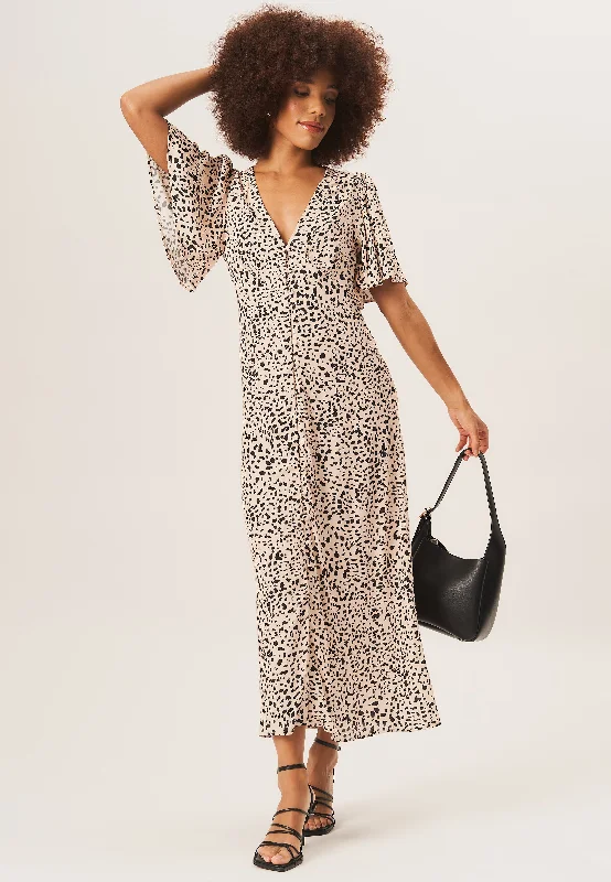 Maxi Women Dress with Floral Print for a Bohemian Vibe Maxi Women Dress with Floral Print for a Bohemian Vibe Beige Animal Print Button Down Midi Dress