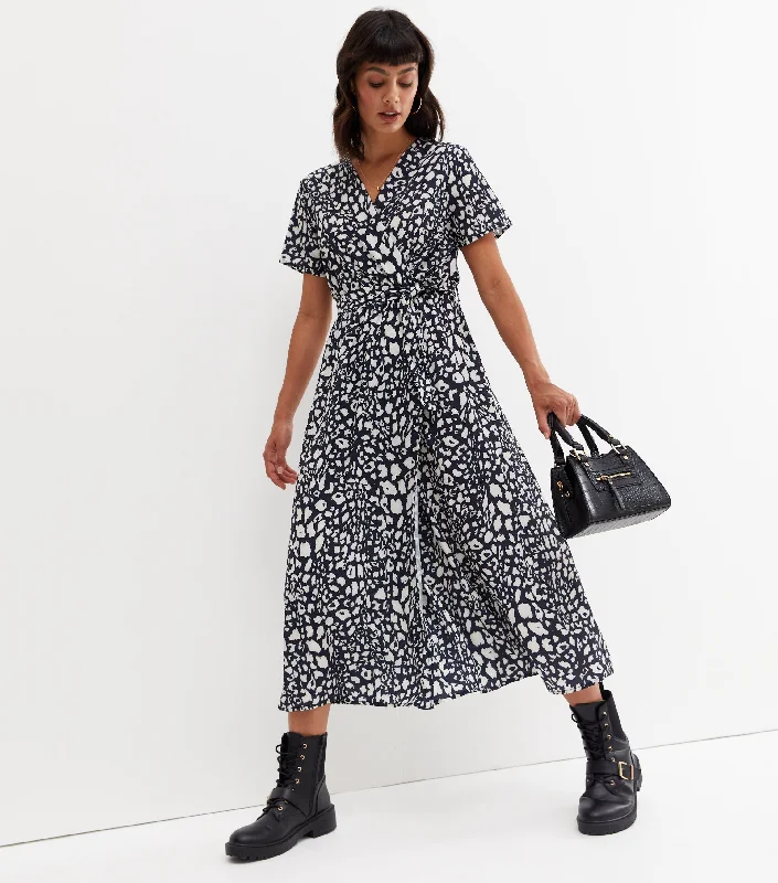 Maxi Women Dress with Floral Print for a Bohemian Vibe Maxi Women Dress with Floral Print for a Bohemian Vibe Black Short Sleeve Animal Print Wrap Maxi Dress