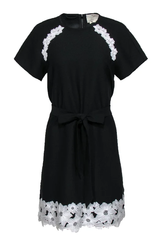 Mini Women Dress with a Short Hem for a Young and Trendy Style Mini Women Dress with a Short Hem for a Young and Trendy Style Kate Spade - Black Short Sleeve Shift Dress w/ Floral Appliques Sz 6