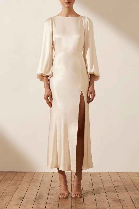 Maxi dresses with an asymmetric hem for a fashion - forward and eye - catching design LA LUNE BALLOON SLEEVE BACKLESS MIDI DRESS - CREAM