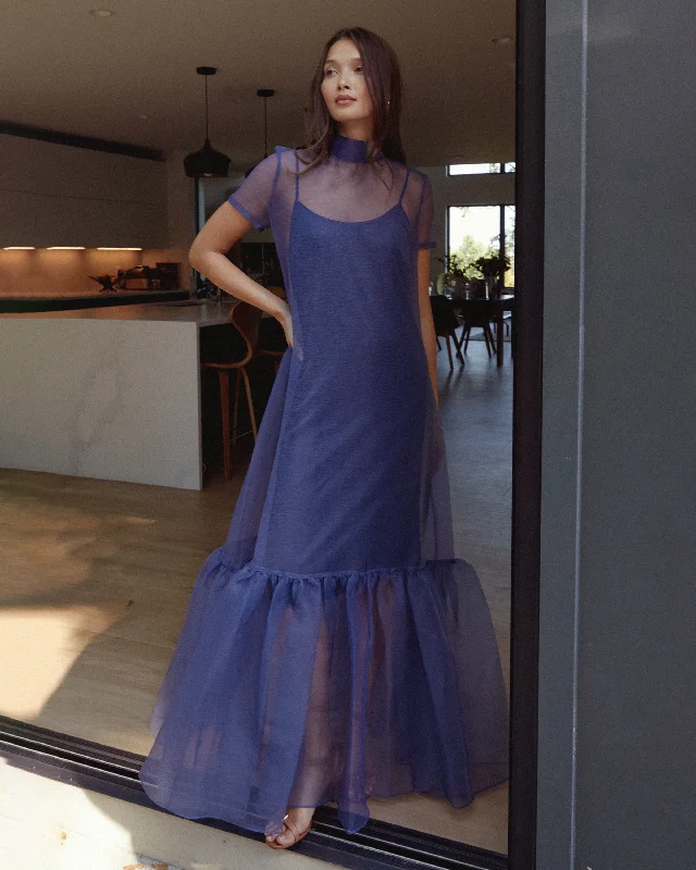 Maxi dresses with a halter neck for a stylish and sophisticated choice Melody Dress
