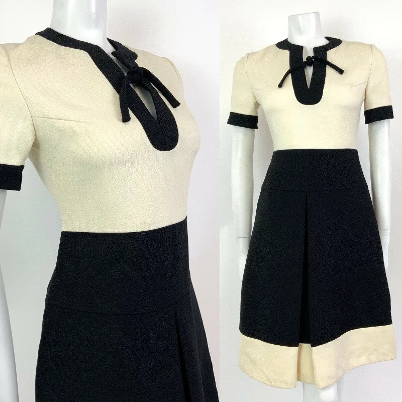 Ruffled Women Dress with Multiple Layers for a Playful and Girly Style Ruffled Women Dress with Multiple Layers for a Playful and Girly Style VINTAGE 60s LOUIS FERAUD CREAM BLACK BOW MOD WOOL SHORT DRESS 8 10