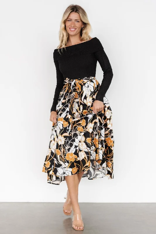 Midi dresses with pom - pom trims for a playful and festive look Selma Off Shoulder Dress | Black Multi Midi dresses with pom - pom trims for a playful and festive look Selma Off Shoulder Dress | Black Multi