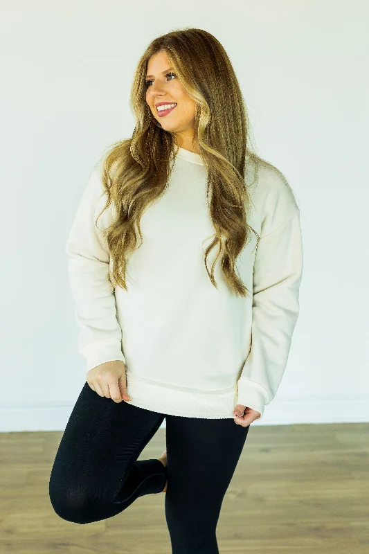 Ruffled Women's Pullovers in Soft Pastels for a Feminine Touch Ivory Fleece Sweatshirt