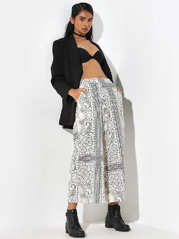Women's fall - appropriate corduroy pants Distressed women jeans for a trendy and edgy look Bombay Paisley Off-White Paisley Print Flared Mid Rise Cotton Pants Women's fall - appropriate corduroy pants Distressed women jeans for a trendy and edgy look Bombay Paisley Off-White Paisley Print Flared Mid Rise Cotton Pants