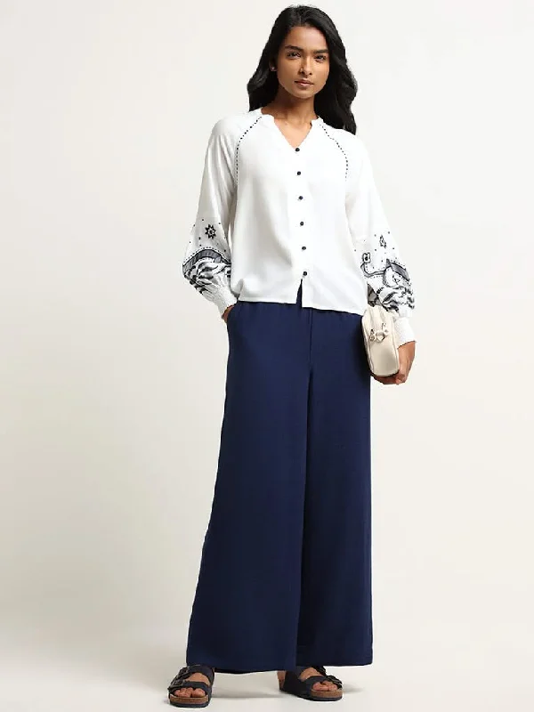 Women's flared office pants Ripped women jeans for a rebellious and fashion - forward style LOV Navy Solid Blended Linen Wide-Leg Pants Women's flared office pants Ripped women jeans for a rebellious and fashion - forward style LOV Navy Solid Blended Linen Wide-Leg Pants