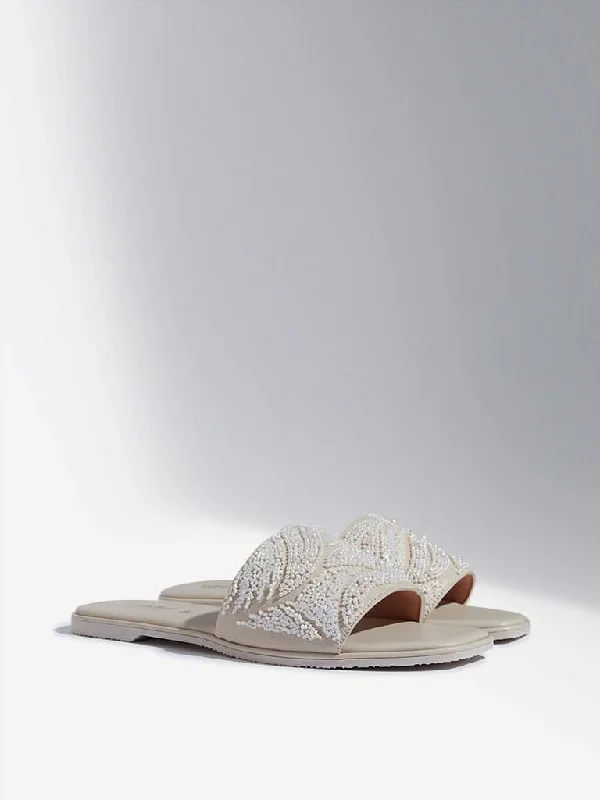 Women's flared office pants Ripped women jeans for a rebellious and fashion - forward style LUNA BLU Ivory Pearlescent Embellished Slides