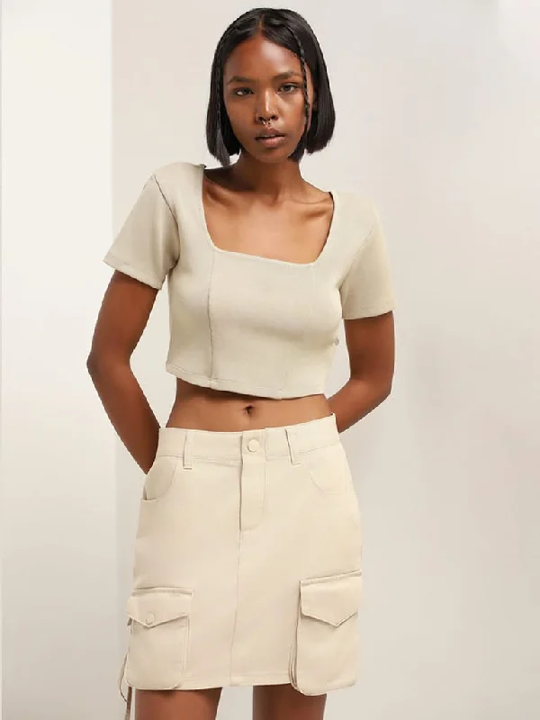 Women's low - rise denim pants Distressed women jeans for a trendy and edgy look Nuon Beige Ribbed Crop Top Women's low - rise denim pants Distressed women jeans for a trendy and edgy look Nuon Beige Ribbed Crop Top