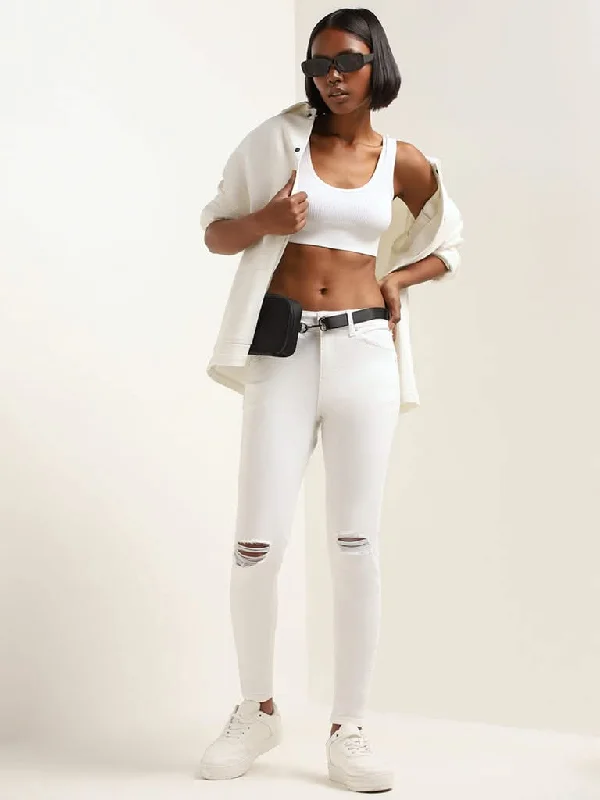 Women's designer brand pants High - rise flare women jeans for a 70s - inspired look Nuon White Mid Rise Slim Fit Distressed Jeans Women's designer brand pants High - rise flare women jeans for a 70s - inspired look Nuon White Mid Rise Slim Fit Distressed Jeans