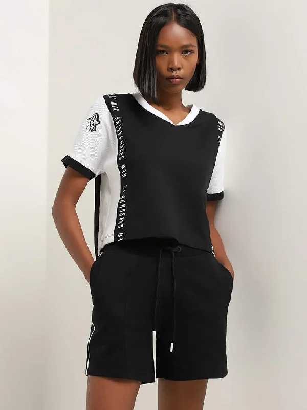 Women's velvet party pants Embellished women jeans with studs or rhinestones for a glamorous touch Studiofit Black Text Print Cotton T-Shirt