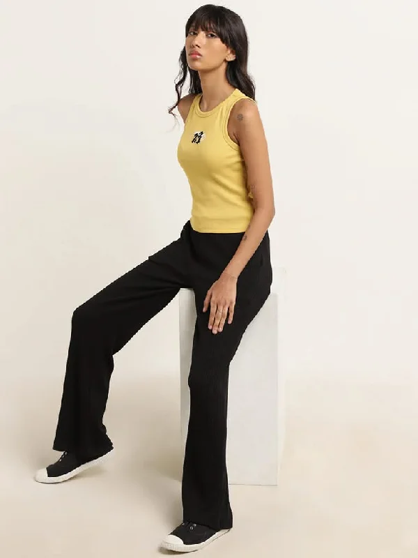 Women's leather moto pants Wide - leg women jeans for a modern and relaxed vibe Studiofit Yellow Cotton Blend Ribbed T-Shirt