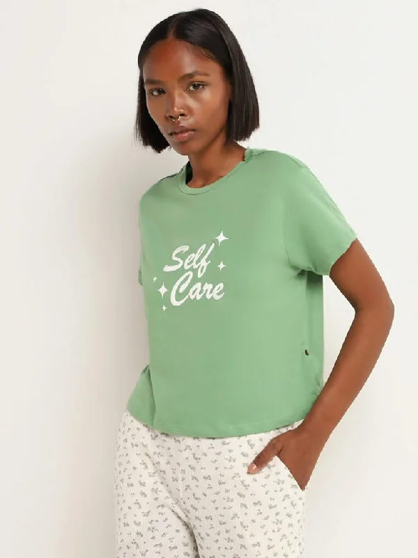 Women's fall - appropriate corduroy pants Distressed women jeans for a trendy and edgy look Superstar Light Green Contrast Printed Cotton Top
