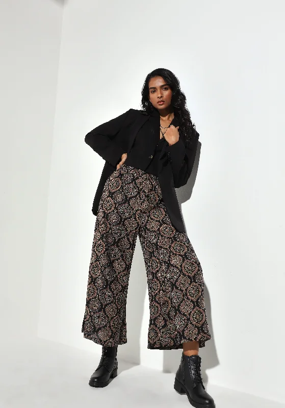 Women's pants for garden parties Colored women jeans in vibrant hues like red and yellow Utsa Black Printed Mid Rise Palazzos