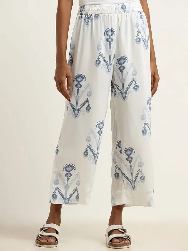 Women's designer brand pants High - rise flare women jeans for a 70s - inspired look Utsa Blue Ethnic Print Palazzos Women's designer brand pants High - rise flare women jeans for a 70s - inspired look Utsa Blue Ethnic Print Palazzos