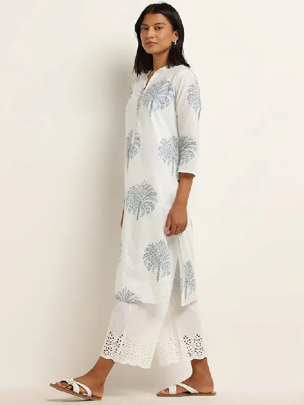 Women's pants for garden parties Colored women jeans in vibrant hues like red and yellow Utsa Blue Foliage Design Cotton A-Line Kurta Women's pants for garden parties Colored women jeans in vibrant hues like red and yellow Utsa Blue Foliage Design Cotton A-Line Kurta