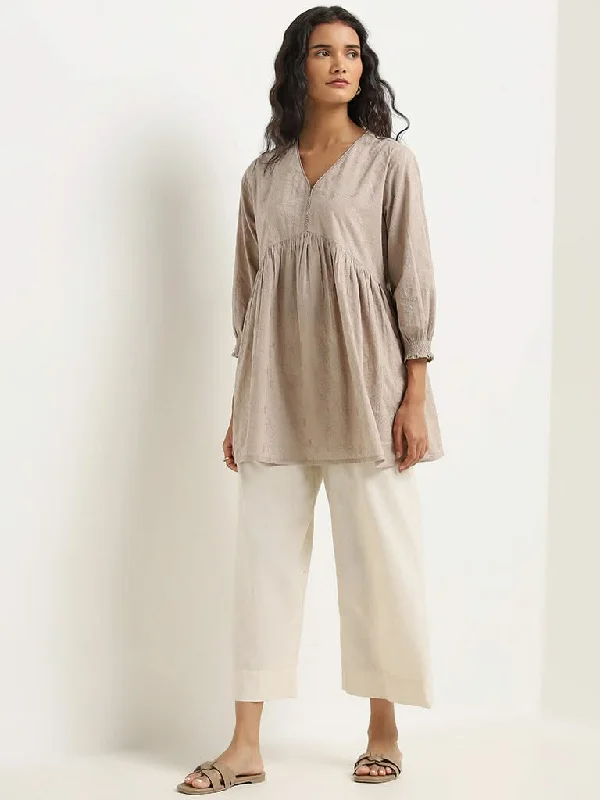 Women's pants for snowboarding Button - fly women jeans with a traditional touch Utsa Light Brown Embroidered Cotton A-line Kurti