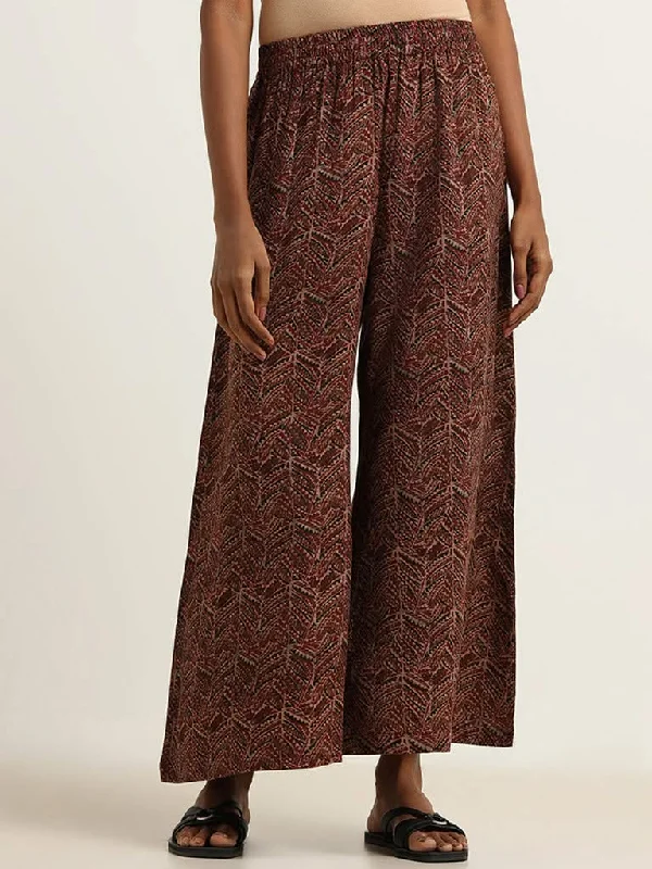 Women's velvet party pants Embellished women jeans with studs or rhinestones for a glamorous touch Utsa Maroon Printed Palazzos Women's velvet party pants Embellished women jeans with studs or rhinestones for a glamorous touch Utsa Maroon Printed Palazzos