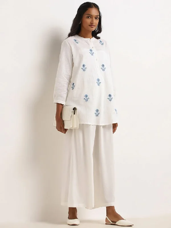 Women's silk evening pants Stretch women jeans for enhanced mobility and comfort Utsa White Embroidered Cotton Tunic
