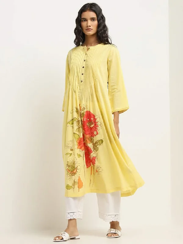 Women's pants with thermal lining Wide - leg women jeans for a modern and relaxed vibe Utsa Yellow Floral Design Cotton A-Line Kurta