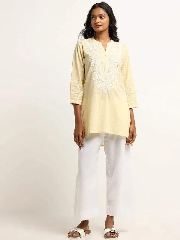 Women's pants for running Wide - leg women jeans for a modern and relaxed vibe Utsa Yellow Floral Embroidered Cotton Kurti