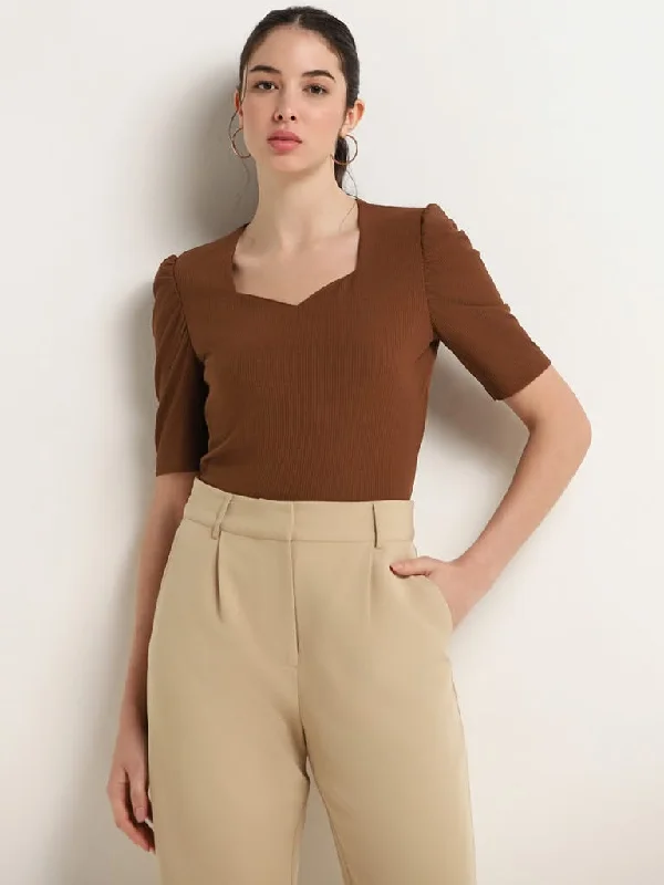 Women's embroidered ethnic pants Ripped women jeans for a rebellious and fashion - forward style Wardrobe Brown Ribbed Fitted Top Women's embroidered ethnic pants Ripped women jeans for a rebellious and fashion - forward style Wardrobe Brown Ribbed Fitted Top