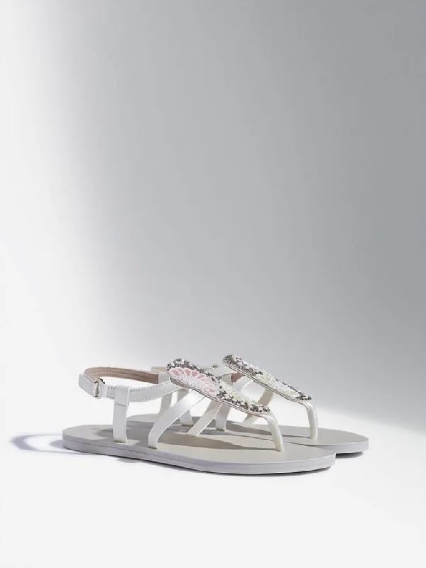 Women's pants for gym workouts Light - wash women jeans for a fresh and summery appearance Yellow Ivory Embellished T-Strap Sandals